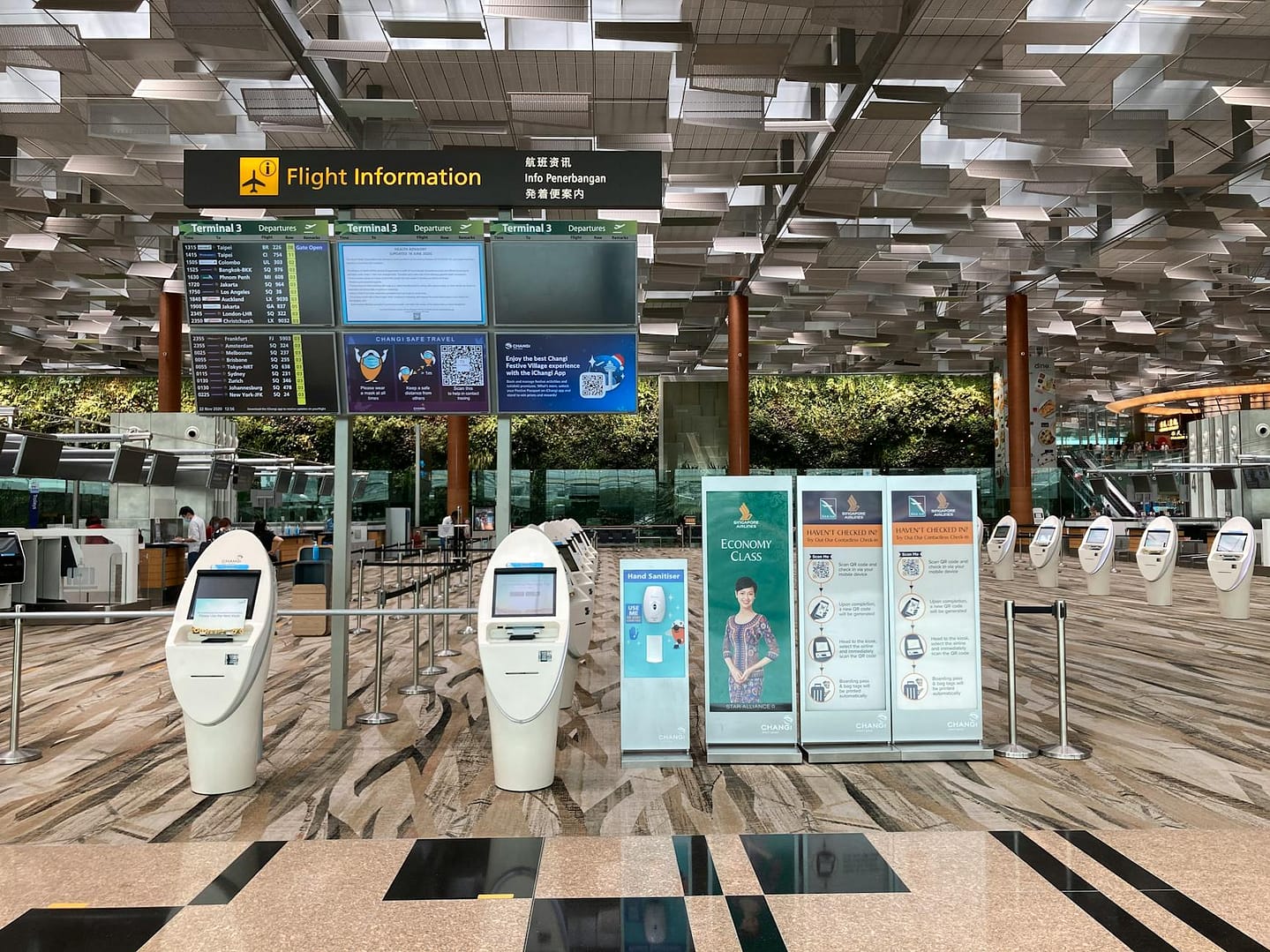 white electronic devices in the airport lobby - Social Media Activity Checked By US Customs