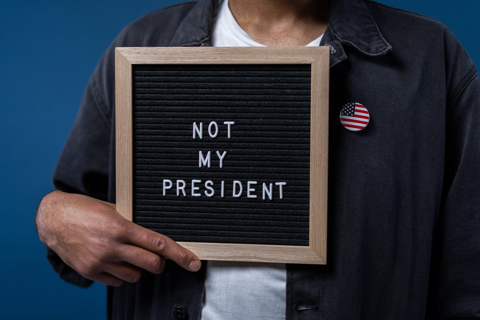 person holding a sign