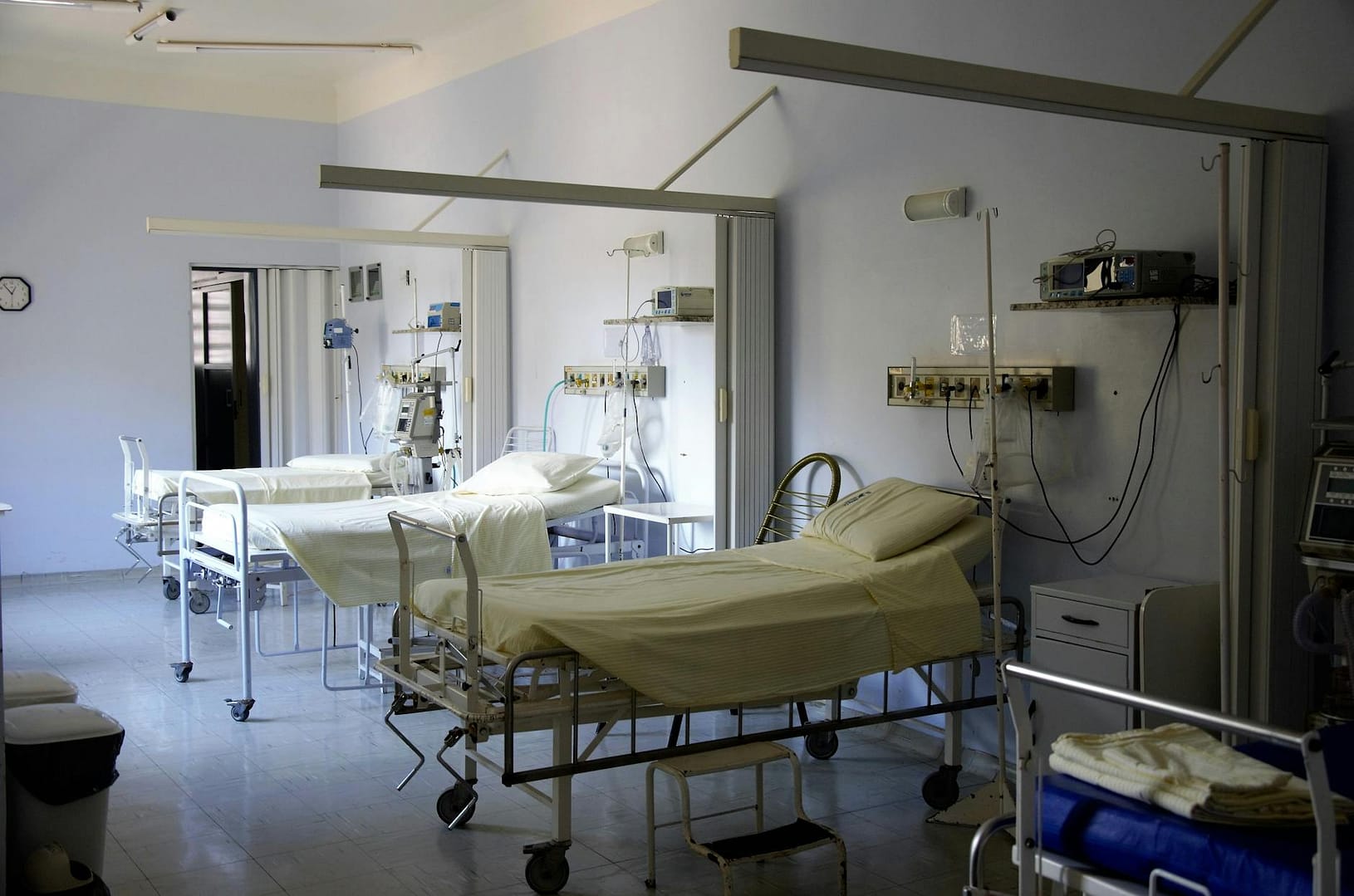 white hospital beds - Healthscope: The Private Equity Fail For Hospitals