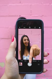 photo of person holding iphone