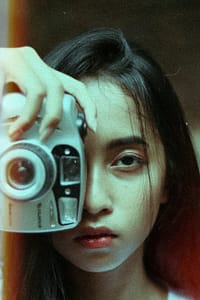 woman taking photo outside
