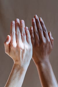 diverse women showing hands in studio