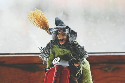 witch riding motorcycle toy