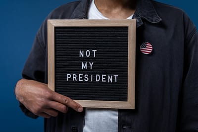 person holding a sign