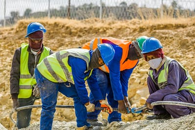 construction workers working together