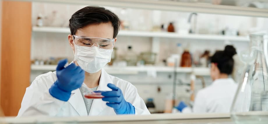 man doing a sample test in the laboratory